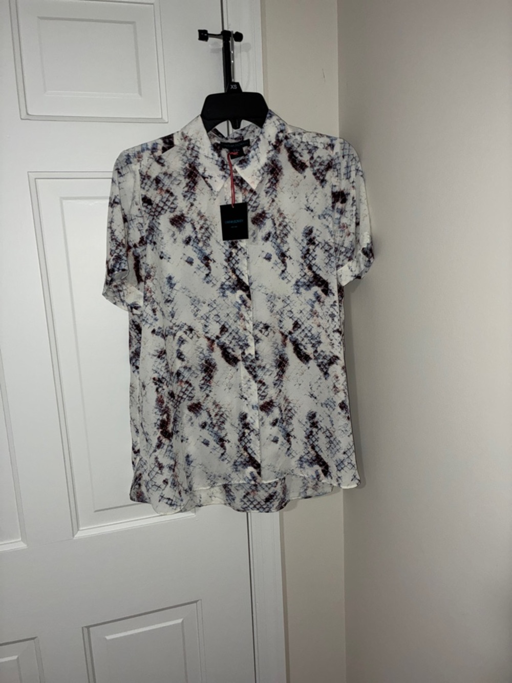 Cynthia Rowley short-sleeve button-up blouse.